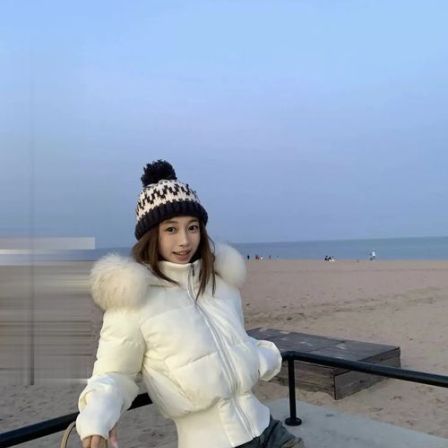 2025年冬季大毛领连帽收腰棉袄女高级感时尚气质加厚内里加绒棉服