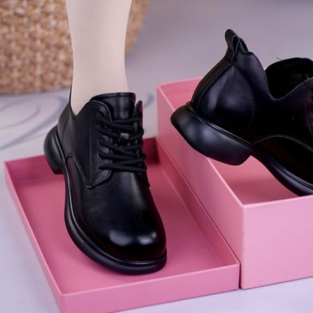 新款头层牛皮春季新款真皮厚底交叉绑带短款马丁靴女