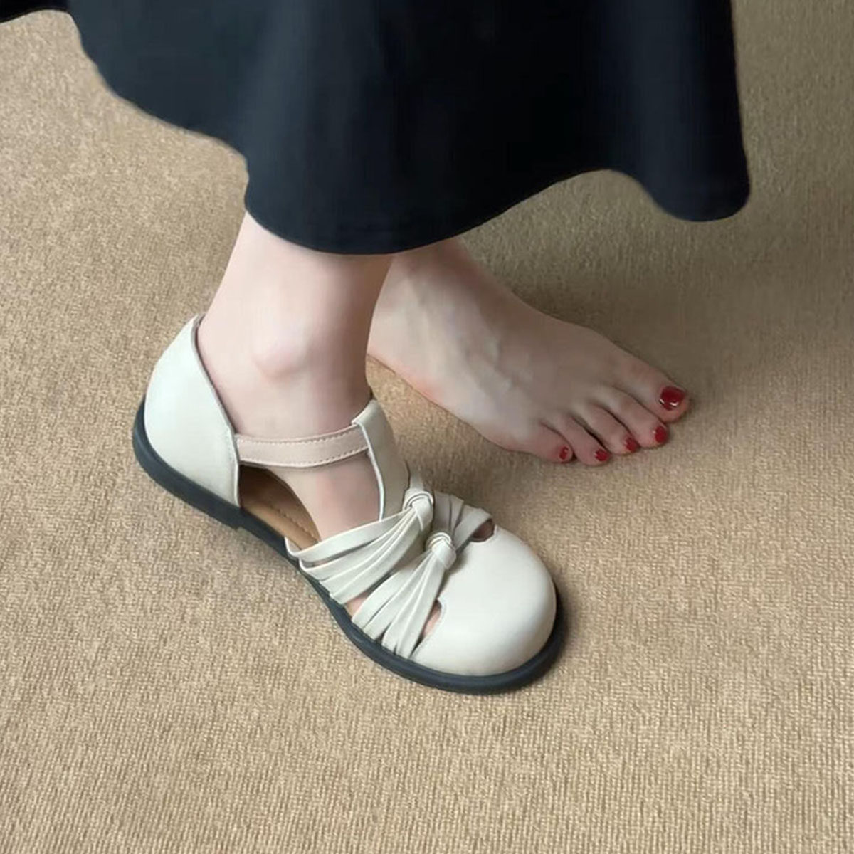 羊皮版~时尚可爱风蝴蝶结编织镂空罗马鞋女设计感一字扣平底凉鞋主图