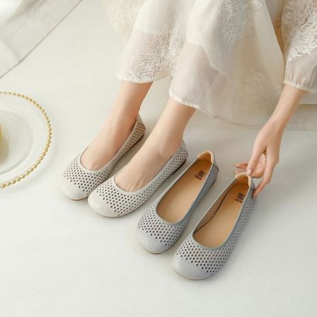 西村名物休闲风镂空平底鞋女夏季真皮软皮舒适洞洞鞋妈妈鞋单鞋